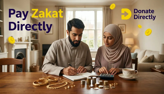 UK couple calculating Zakat with gold and cash at home